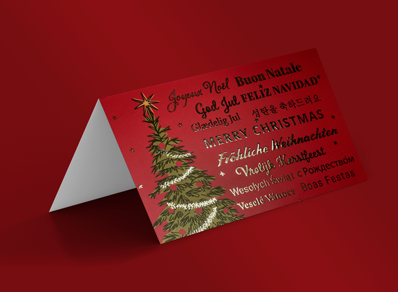 Biglietto Natale pieghevole rosso testo oro Buon Natale multilingue e albero illustrato. Sprint24.